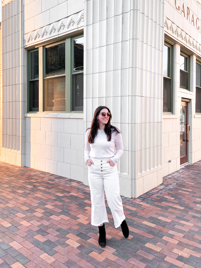 Suffragette White: The Interesting History to Know
Image description: me standing in front of a white building, wearing a white monochrome outfit.